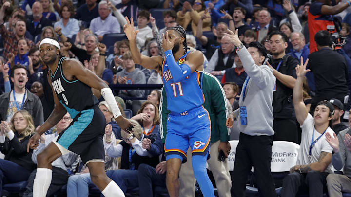 Nov 23, 2025; Oklahoma City, Oklahoma, USA; Oklahoma City Thunder guard Isaiah Joe (11) gestures after scoring a basket against the Portland Trail Blazers during the second half at Paycom Center. Mandatory Credit: Alonzo Adams-Imagn Images