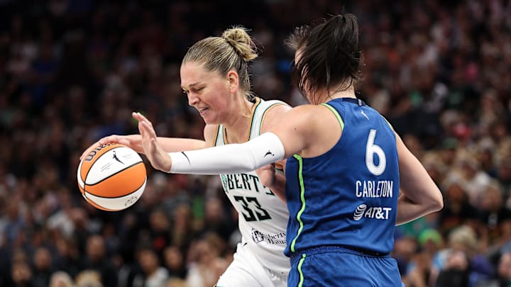 Aug 16, 2025; Minneapolis, Minnesota, USA; New York Liberty center Emma Meesseman (33) drives towards the basket as Minnesota Lynx forward Bridget Carleton (6) defends during the first quarter at Target Center. Mandatory Credit: Matt Krohn-Imagn Images Aug 16, 2025; Minneapolis, Minnesota, USA; New York Liberty center Emma Meesseman (33) drives towards the basket as Minnesota Lynx forward Bridget Carleton (6) defends during the first quarter at Target Center. Mandatory Credit: Matt Krohn-Imagn Images