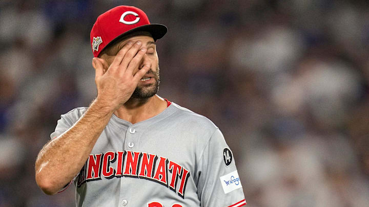 Cincinnati Reds pitcher Nick Martinez (28) walks for the dugout after being pulled in the sixth inning of the MLB National League Wild Card Game 2 between the Los Angeles Dodgers and the Cincinnati Reds at Dodger Stadium in Los Angeles on Wednesday, Oct. 1, 2025. The Reds were eliminated from the postseason with an 8-4 loss to the reining World Series Champions La Dodgers.