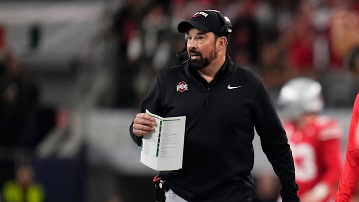 Ohio State Buckeyes head coach Ryan Day watches from the sideline during the Cotton Bowl at AT&T Stadium in Arlington, Texas for the College Football Playoff quarterfinal game against the Miami Hurricanes on Dec. 31, 2025.