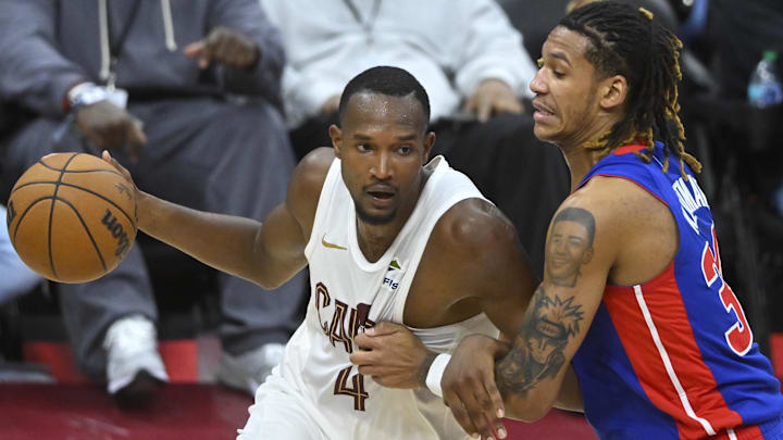 Oct 14, 2025; Cleveland, Ohio, USA; Cleveland Cavaliers center Evan Mobley (4) drives against Detroit Pistons forward Bobi Klintman (34) in the fourth quarter at Rocket Arena. Mandatory Credit: David Richard-Imagn Images Oct 14, 2025; Cleveland, Ohio, USA; Cleveland Cavaliers center Evan Mobley (4) drives against Detroit Pistons forward Bobi Klintman (34) in the fourth quarter at Rocket Arena. Mandatory Credit: David Richard-Imagn Images