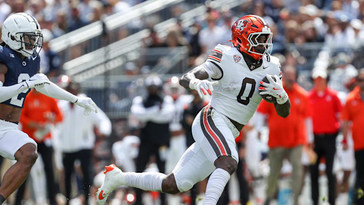 Sep 7, 2024; University Park, Pennsylvania, USA; Bowling Green Falcons tight end Harold Fannin Jr (0) runs with the ball during the second quarter against the Penn State Nittany Lions at Beaver Stadium. Mandatory Credit: Matthew O'Haren-Imagn Images Sep 7, 2024; University Park, Pennsylvania, USA; Bowling Green Falcons tight end Harold Fannin Jr (0) runs with the ball during the second quarter against the Penn State Nittany Lions at Beaver Stadium. Mandatory Credit: Matthew O'Haren-Imagn Images