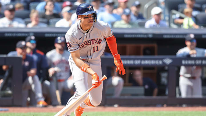Aug 10, 2025; Bronx, New York, USA;  Houston Astros right fielder Cam Smith (11) hits a two run double in the fifth inning against the New York Yankees at Yankee Stadium. 