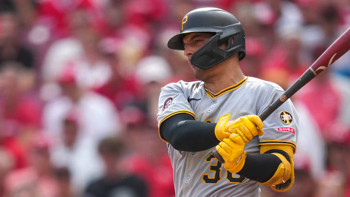 Pittsburgh Pirates second baseman Nick Yorke (38) hits a sacrifice to score Horwitz from from third base in the eighth inning of the MLB National League game between the Cincinnati Reds and the Pittsburgh Pirates at Great American Ball Park in downtown Cincinnati on Thursday, Sept. 25, 2025. The Reds won, 2-1.