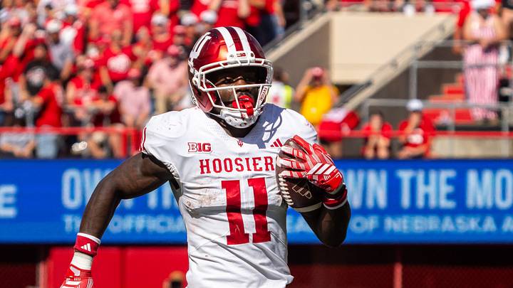Oct 10, 2026; Lincoln, Nebraska, USA; Indiana Hoosiers wide receiver Nick Marsh (11) runs after a catch for a touchdown against the Nebraska Cornhuskers during the fourth quarter at Memorial Stadium. Mandatory Credit: Dylan Widger-Imagn Images Oct 10, 2026; Lincoln, Nebraska, USA; Indiana Hoosiers wide receiver Nick Marsh (11) runs after a catch for a touchdown against the Nebraska Cornhuskers during the fourth quarter at Memorial Stadium. Mandatory Credit: Dylan Widger-Imagn Images