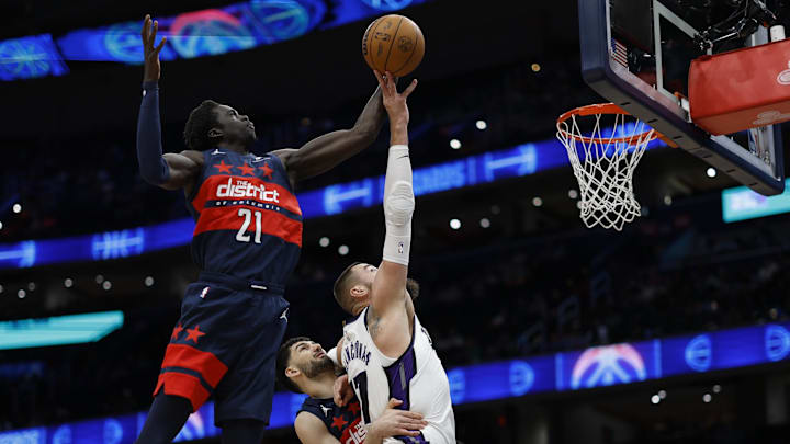 Apr 2, 2025; Washington, District of Columbia, USA; Washington Wizards forward JT Thor (21) leaps over Sacramento Kings center Jonas Valanciunas (17) to rebound the ball in the first half at Capital One Arena. Mandatory Credit: Geoff Burke-Imagn Images Apr 2, 2025; Washington, District of Columbia, USA; Washington Wizards forward JT Thor (21) leaps over Sacramento Kings center Jonas Valanciunas (17) to rebound the ball in the first half at Capital One Arena. Mandatory Credit: Geoff Burke-Imagn Images