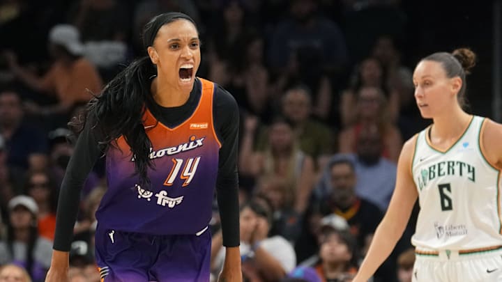 Mercury forward DeWanna Bonner (14) celebrates her defensive stop against New York Liberty forward Stephanie Talbot (6) at PHX Arena, Aug. 30, 2025, in Phoenix.