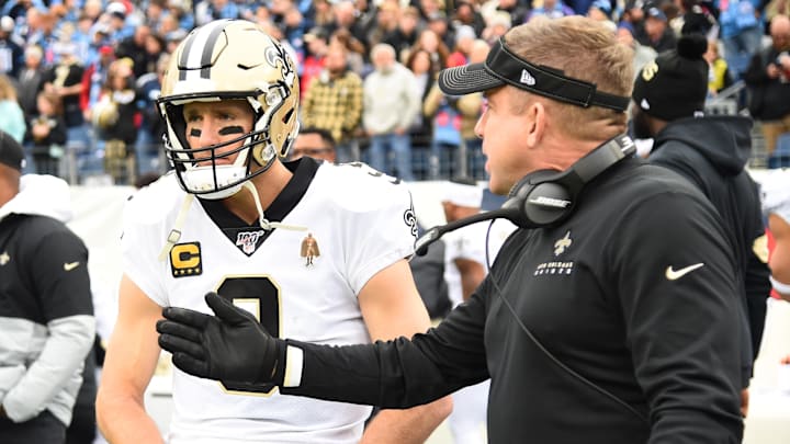 New Orleans Saints quarterback Drew Brees (9) and head coach Sean Payton before the game against the Tennessee Titans at Nissan Stadium.