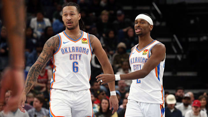 Mar 5, 2025; Memphis, Tennessee, USA; Oklahoma City Thunder forward Jaylin Williams (6) and guard Shai Gilgeous-Alexander (2) walk to the bench during a time out during the second quarter against the Memphis Grizzlies at FedExForum. Mandatory Credit: Petre Thomas-Imagn Images