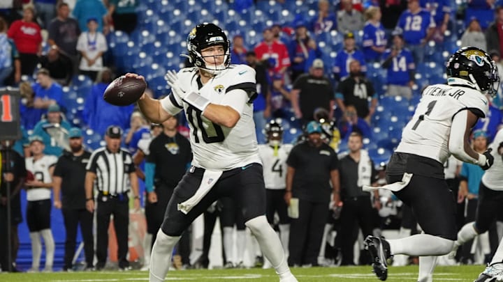 Sep 23, 2024; Orchard Park, New York, USA; Jacksonville Jaguars quarterback Mac Jones (10) throws against the Buffalo Bills during the second half at Highmark Stadium. Mandatory Credit: Gregory Fisher-Imagn Images