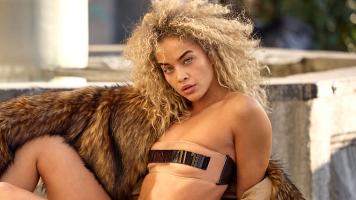 Jasmine Sanders was photographed by Derek Kettela in Zurich, Switzerland. Top by Adriana Degreas. Jacket by Adrienne Landau.