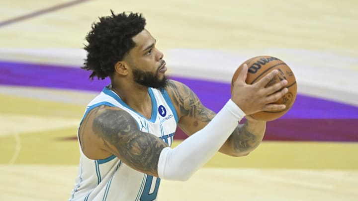 Dec 14, 2025; Cleveland, Ohio, USA; Charlotte Hornets forward Miles Bridges (0) shoots in the fourth quarter against the Cleveland Cavaliers at Rocket Arena. Mandatory Credit: David Richard-Imagn Images Dec 14, 2025; Cleveland, Ohio, USA; Charlotte Hornets forward Miles Bridges (0) shoots in the fourth quarter against the Cleveland Cavaliers at Rocket Arena. Mandatory Credit: David Richard-Imagn Images