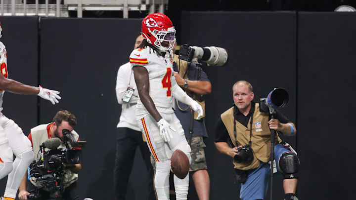 Sep 22, 2024; Atlanta, Georgia, USA; Kansas City Chiefs wide receiver Rashee Rice (4) reacts after a touchdown against the Atlanta Falcons in the second quarter at Mercedes-Benz Stadium. Mandatory Credit: Brett Davis-Imagn Images
