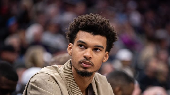 Mar 7, 2025; Sacramento, California, USA; San Antonio Spurs center Victor Wembanyama (1) looks on from the bench during the fourth quarter of the game against the Sacramento Kings at Golden 1 Center. Mandatory Credit: Ed Szczepanski-Imagn Images