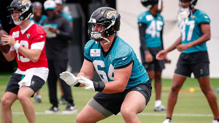 May 10, 2025; Jacksonville, FL, USA; Jacksonville Jaguars offensive lineman Wyatt Milum (64) participates in a drill during rookie minicamp at Miller Electric Center. Mandatory Credit: Travis Register-Imagn Images