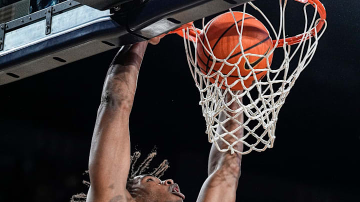 Michigan forward Morez Johnson Jr. (21) dunks against USC during the second half at Crisler Center in Ann Arbor on Friday, Jan. 2, 2026.