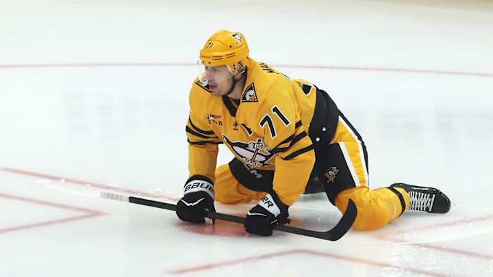 Apr 27, 2026; Pittsburgh, Pennsylvania, USA;  Pittsburgh Penguins center Evgeni Malkin (71) stretches on the ice to warm up against the Philadelphia Flyers in game five of the first round of the 2026 Stanley Cup Playoffs at PPG Paints Arena. Mandatory Credit: Charles LeClaire-Imagn Images
