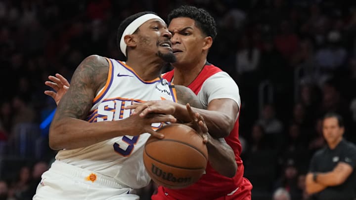 Dec 7, 2024; Miami, Florida, USA; Phoenix Suns guard Bradley Beal (3) drives to the basket against Miami Heat guard Dru Smith (12) during the first half at Kaseya Center. Mandatory Credit: Jim Rassol-Imagn Images Dec 7, 2024; Miami, Florida, USA; Phoenix Suns guard Bradley Beal (3) drives to the basket against Miami Heat guard Dru Smith (12) during the first half at Kaseya Center. Mandatory Credit: Jim Rassol-Imagn Images