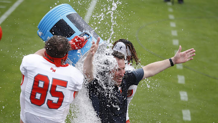 K.C. Keeler received a celebratory water pour after his Sam Houston State Bearkats won the 2021 FCS national championship.  He is at Temple now and tops the list of six new football coaches in the American Athletic Conference.