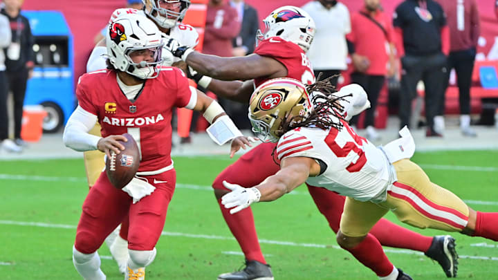 Jan 5, 2025; Glendale, Arizona, USA; Arizona Cardinals quarterback Kyler Murray (1) escapes a tackle by San Francisco 49ers linebacker Fred Warner (54) in the first half at State Farm Stadium. Mandatory Credit: Matt Kartozian-Imagn Images Jan 5, 2025; Glendale, Arizona, USA; Arizona Cardinals quarterback Kyler Murray (1) escapes a tackle by San Francisco 49ers linebacker Fred Warner (54) in the first half at State Farm Stadium. Mandatory Credit: Matt Kartozian-Imagn Images