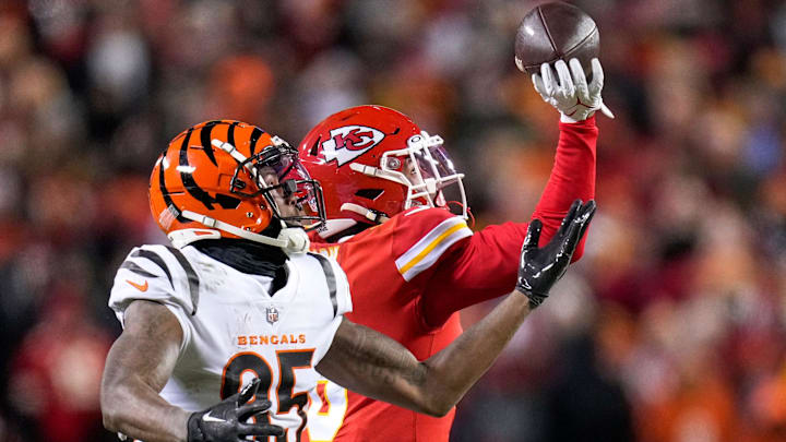 Kansas City Chiefs safety Bryan Cook (6) tips a pass intended for Cincinnati Bengals wide receiver Tee Higgins (85) before it is intercepted by cornerback Joshua Williams (23) in the fourth quarter of the AFC championship NFL game between the Cincinnati Bengals and the Kansas City Chiefs, Sunday, Jan. 29, 2023, at Arrowhead Stadium in Kansas City, Mo. The Kansas City Chiefs advanced to the Super Bowl with a 23-20 win over the Bengals.

Cincinnati Bengals At Kansas City Chiefs Afc Championship