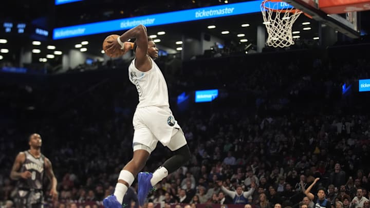 Apr 3, 2025; Brooklyn, New York, USA; Minnesota Timberwolves shooting guard Anthony Edwards (5) dunks the ball against the Brooklyn Nets during the second half at Barclays Center. Mandatory Credit: Gregory Fisher-Imagn Images