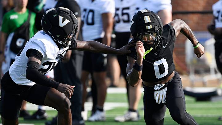 Vanderbilt wide receiver Junior Sherrill (0) runs a route against cornerback Cayden Daniels (26) during fall practice Wednesday, July 30, 2025, in Nashville, Tenn. Vanderbilt wide receiver Junior Sherrill (0) runs a route against cornerback Cayden Daniels (26) during fall practice Wednesday, July 30, 2025, in Nashville, Tenn.