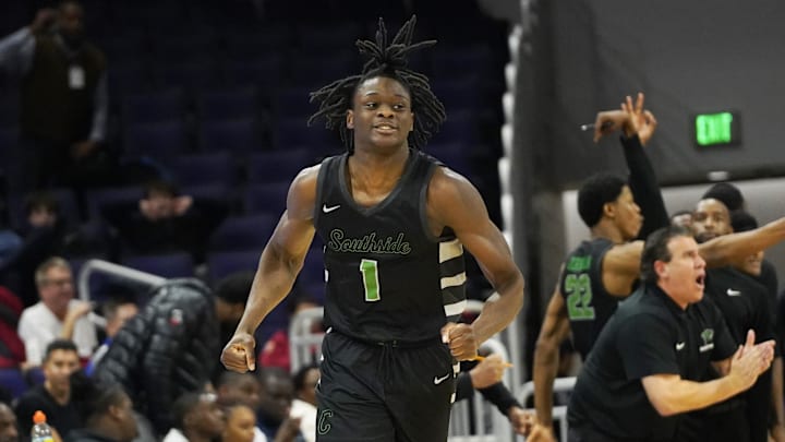 Dec 13, 2023; Evanston, Illinois, USA; Chicago State Cougars guard Wesley Cardet Jr. (1) celebrates