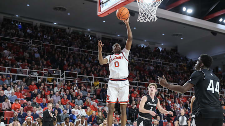 Nov 25, 2023; Queens, New York, USA; St. John's basketball guard Cruz Davis (0) takes a jump shot in