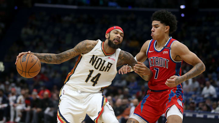 Dec 10, 2021; New Orleans, Louisiana, USA; New Orleans Pelicans forward Brandon Ingram (14) is defended by Detroit Pistons guard Killian Hayes (7) in the second half at the Smoothie King Center. Mandatory Credit: Chuck Cook-Imagn Images