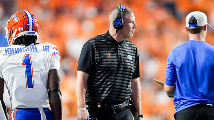 Florida head coach Billy Napier, center, during a SEC conference game between Tennessee and Florida in Neyland Stadium on Saturday, Oct. 12, 2024.