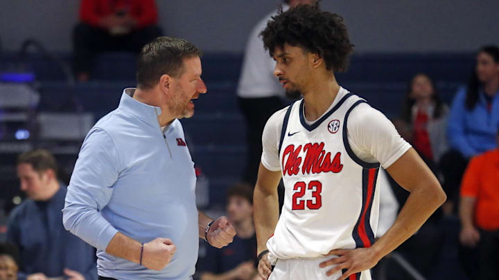 Feb 21, 2026; Oxford, Mississippi, USA; Mississippi Rebels head coach Chris Beard talks with guard Patton Pinkins (23) during the second half against the Florida Gators at The Sandy and John Black Pavilion at Ole Miss. Mandatory Credit: Petre Thomas-Imagn Images
