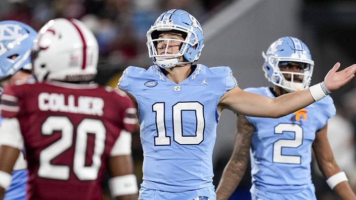 Sep 2, 2023; Charlotte, North Carolina, USA; North Carolina Tar Heels quarterback Drake Maye (10) motions for the fans during the second half against the South Carolina Gamecocks at Bank of America Stadium. Mandatory Credit: Jim Dedmon-Imagn Images