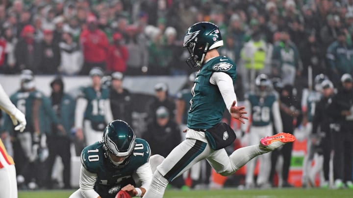 Dec 3, 2023; Philadelphia, Pennsylvania, USA; Philadelphia Eagles place kicker Jake Elliott (4) kicks a field goal as punter Braden Mann (10) holds the football against the San Francisco 49ers at Lincoln Financial Field. 