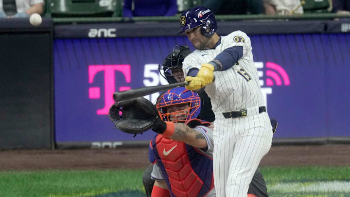 Milwaukee Brewers outfielder Blake Perkins (16) hits a deep fly ball to score second baseman Brice Turang during the fifth inning of their wild-card playoff game against the New York Mets Wednesday, October 2, 2024 at American Family Field in Milwaukee, Wisconsin. Milwaukee Brewers outfielder Blake Perkins (16) hits a deep fly ball to score second baseman Brice Turang during the fifth inning of their wild-card playoff game against the New York Mets Wednesday, October 2, 2024 at American Family Field in Milwaukee, Wisconsin.