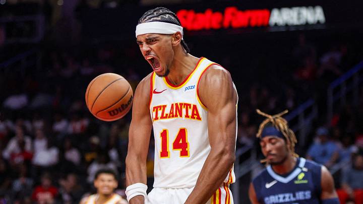 Oct 5, 2026; Atlanta, Georgia, USA; Atlanta Hawks forward Asa Newell (14) reacts after a dunk against the Memphis Grizzlies in the fourth quarter at State Farm Arena. Mandatory Credit: Brett Davis-Imagn Images     TPX IMAGES OF THE DAY