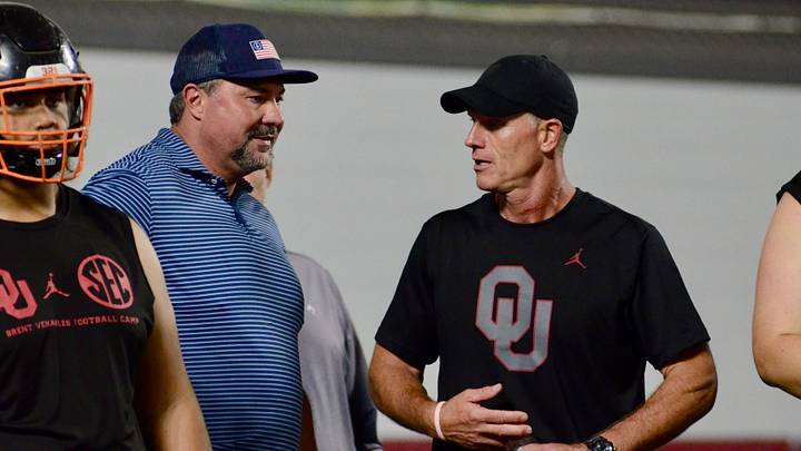 Oklahoma coach Brent Venables talks to Texas Tech Board of Regents Chairman Cody Campbell at one of the Sooners' elite camps. Oklahoma coach Brent Venables talks to Texas Tech Board of Regents Chairman Cody Campbell at one of the Sooners' elite camps.