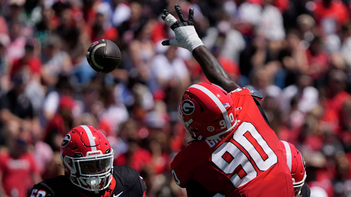 Georgia defensive lineman Elijah Griffin (90) goes up to bat down a pass during the Georgia G-Day spring football game in Athens, Ga., on Saturday, April 12, 2025.