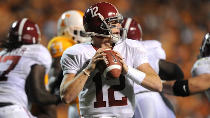 Oct 23, 2010; Knoxville, TN, USA; Alabama Crimson Tide quarterback Greg McElroy (12) sets up to pass against the Tennessee Volunteers during the first half at Neyland Stadium. Mandatory credit: Don McPeak-Imagn Images
