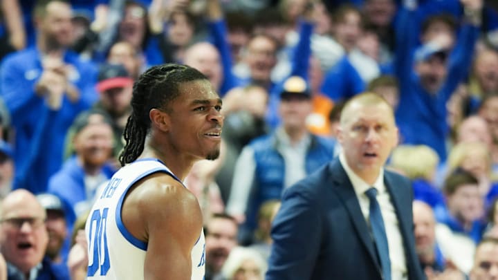 Kentucky's Otega Oweh (00) reacts after hitting a late-game dunk to take the wind out of Tennessee's sails during their game at Rupp Arena in Lexington, Ky. on Feb. 11, 2025.