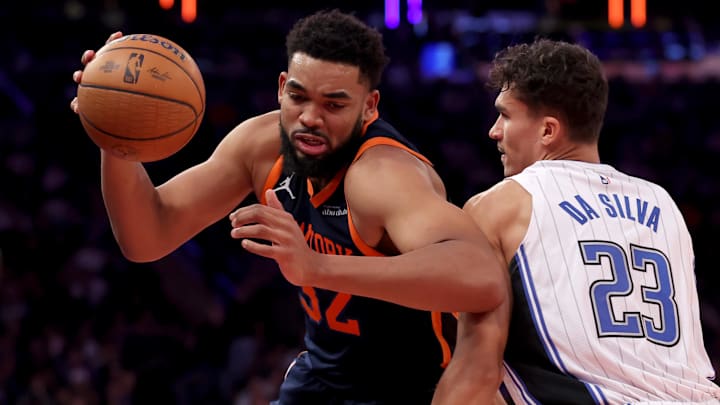 Dec 3, 2024; New York, New York, USA; New York Knicks center Karl-Anthony Towns (32) controls the ball against Orlando Magic forward Tristan da Silva (23) during the third quarter at Madison Square Garden.
