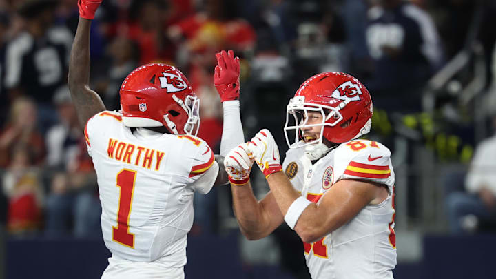 Nov 27, 2025; Arlington, Texas, USA; Kansas City Chiefs wide receiver Xavier Worthy (1) and Kansas City Chiefs tight end Travis Kelce (87) celebrate after a touchdown against the Dallas Cowboys during the first quarter at AT&T Stadium. Mandatory Credit: Kevin Jairaj-Imagn Images