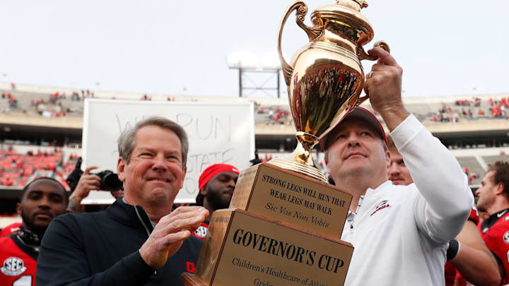 Georgia Governor Brian Kemp presents Georgia head coach Kirby Smart with the Governors Cup after a NCAA college football game between Georgia Tech and Georgia in Athens, Ga., on Saturday, Nov. 26, 2022. Georgia won 37-14.
News Joshua L Jones Georgia Governor Brian Kemp presents Georgia head coach Kirby Smart with the Governors Cup after a NCAA college football game between Georgia Tech and Georgia in Athens, Ga., on Saturday, Nov. 26, 2022. Georgia won 37-14.
News Joshua L Jones