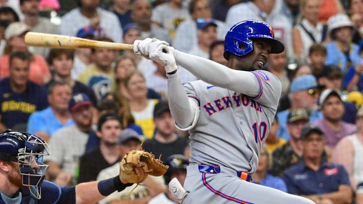 Aug 10, 2025; Milwaukee, Wisconsin, USA; New York Mets third baseman Ronny Mauricio (10) drives in a run with a base hit in the third inning against the Milwaukee Brewers at American Family Field. Mandatory Credit: Benny Sieu-Imagn Images Aug 10, 2025; Milwaukee, Wisconsin, USA; New York Mets third baseman Ronny Mauricio (10) drives in a run with a base hit in the third inning against the Milwaukee Brewers at American Family Field. Mandatory Credit: Benny Sieu-Imagn Images