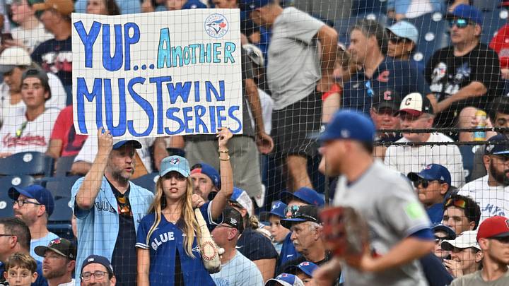 Sep 2, 2026; Cleveland, Ohio, USA; Toronto Blue Jays fans hold a sign during the game between the Cleveland Guardians and the Blue Jays at Progressive Field. Mandatory Credit: Ken Blaze-Imagn Images
