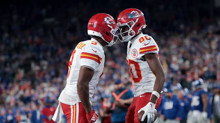 Sep 21, 2025; East Rutherford, New Jersey, USA; Kansas City Chiefs wide receiver Tyquan Thornton (80) and wide receiver Juju Smith-Schuster (9) celebrate after a reception against the New York Giants in the fourth quarter at MetLife Stadium. Mandatory Credit: Vincent Carchietta-Imagn Images