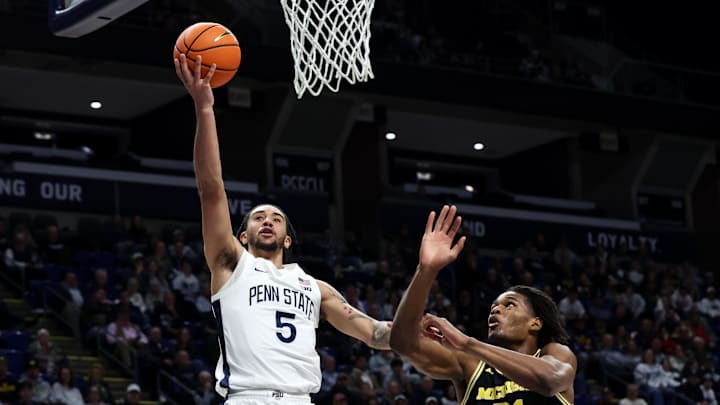 Jan 6, 2026; University Park, Pennsylvania, USA; Penn State Nittany Lions guard Freddie Dilione V (5) drives the ball to the basket during the first half against the Michigan Wolverines at Bryce Jordan Center. Jan 6, 2026; University Park, Pennsylvania, USA; Penn State Nittany Lions guard Freddie Dilione V (5) drives the ball to the basket during the first half against the Michigan Wolverines at Bryce Jordan Center.