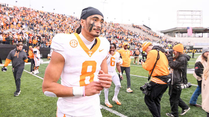 Nov 30, 2024; Nashville, Tennessee, USA;  Tennessee Volunteers quarterback Nico Iamaleava (8) walks off the field after the win against the Vanderbilt Commodores during the second half at FirstBank Stadium. Mandatory Credit: Steve Roberts-Imagn Images