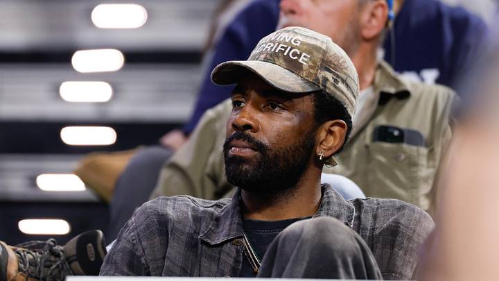 Mar 29, 2026; Fort Worth, TX, USA; Dallas Mavericks guard Kyrie Irving looks on from the stands during the second half of the game between the UConn Huskies and Notre Dame Fighting Irish at Dickies Arena. Mandatory Credit: Chris Jones-Imagn Images Mar 29, 2026; Fort Worth, TX, USA; Dallas Mavericks guard Kyrie Irving looks on from the stands during the second half of the game between the UConn Huskies and Notre Dame Fighting Irish at Dickies Arena. Mandatory Credit: Chris Jones-Imagn Images