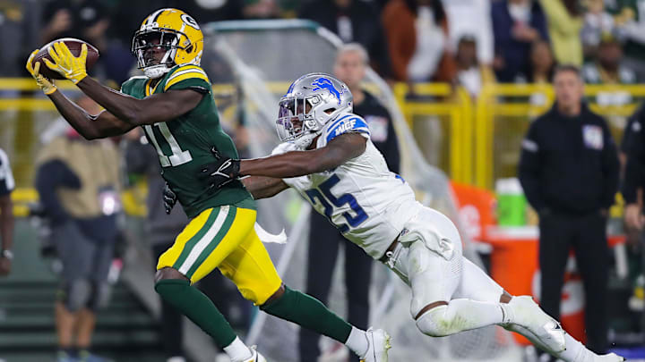 Green Bay Packers receiver Jayden Reed (11) beats Detroit Lions cornerback Will Harris during last year's game at Lambeau Field.